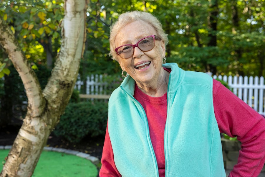 Smiling senior woman outside